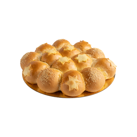 Christmas butter-enriched bread with a lucky coin